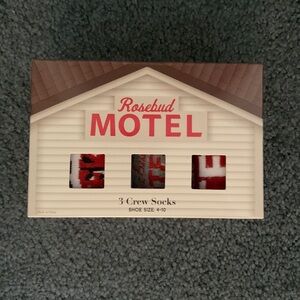 Schitt’s Creek Rosebud Motel themed crew socks. Three pack. New with tags.